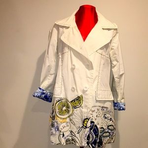 Desigual White Color Trench Coat with Bold Colorful print on bottom of Coat.